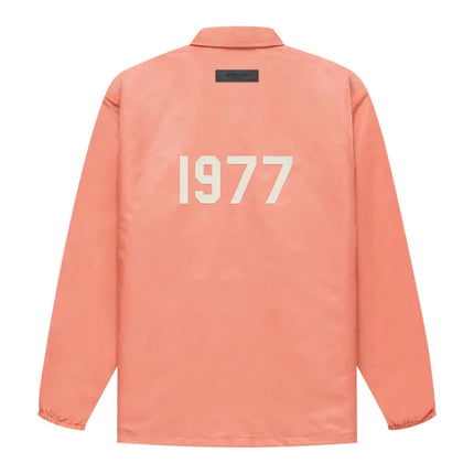 FEAR OF GOD ESSENTIALS 1977 Nylon Coach Jacket - Coral (SS22)