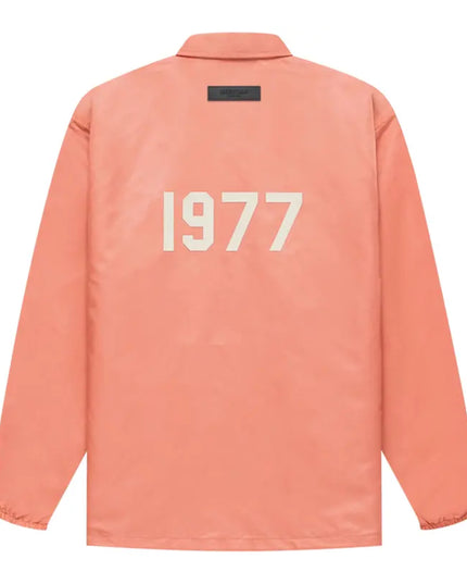 FEAR OF GOD ESSENTIALS 1977 Nylon Coach Jacket - Coral (SS22)